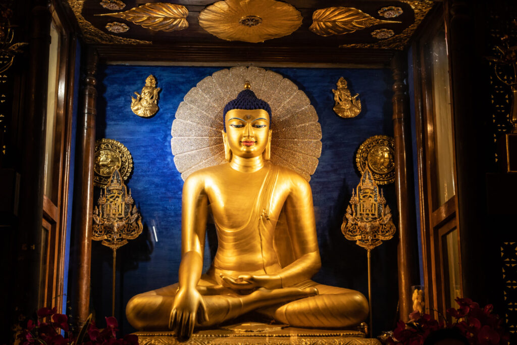 Golden Buddha statue at the Mahabodhi Temple in Bodh Gaya, India